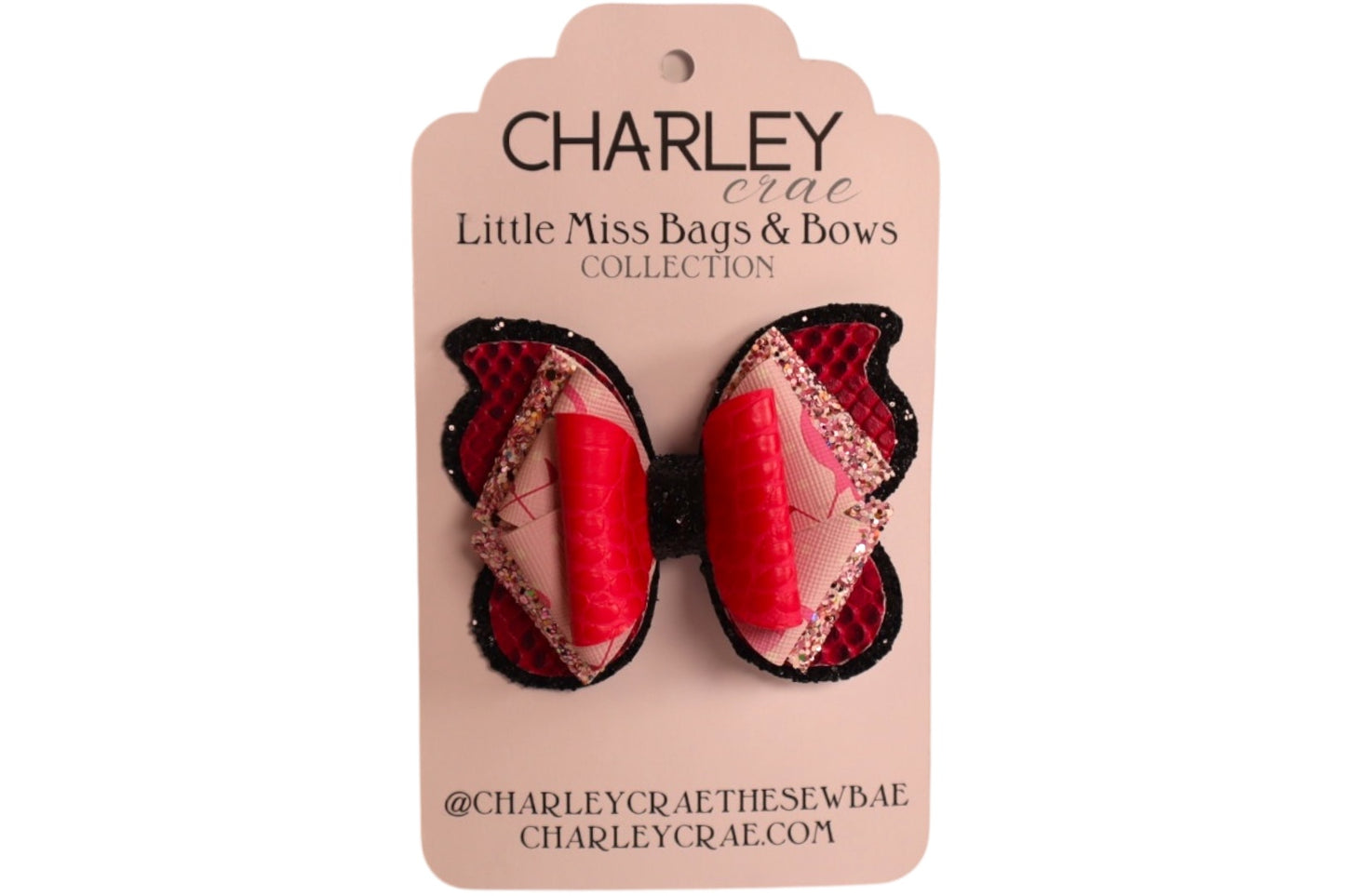 Handmade 4” pink faux snake skin butterfly hairbow
