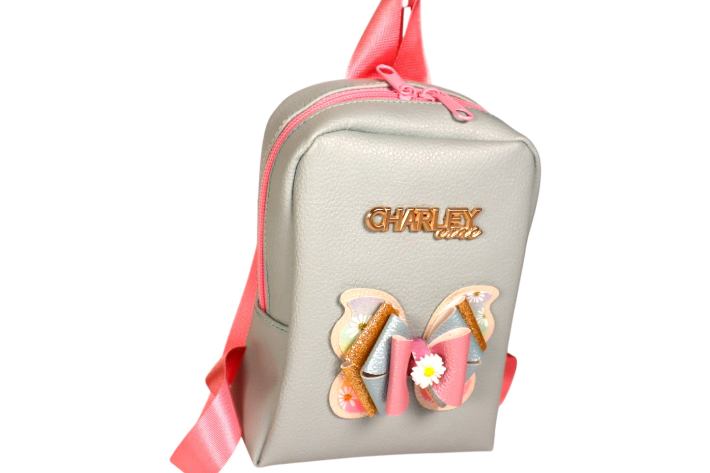 Handmade light blue toddler backpack with pink straps and butterfly bow accent