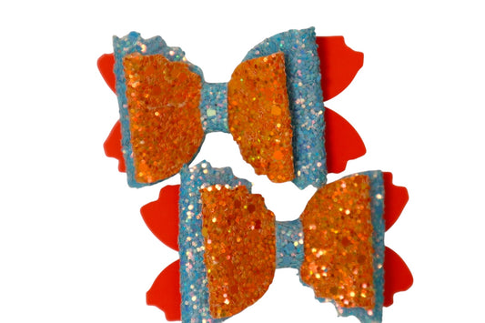 Handmade orange and blue sparkling pigtail hair bows