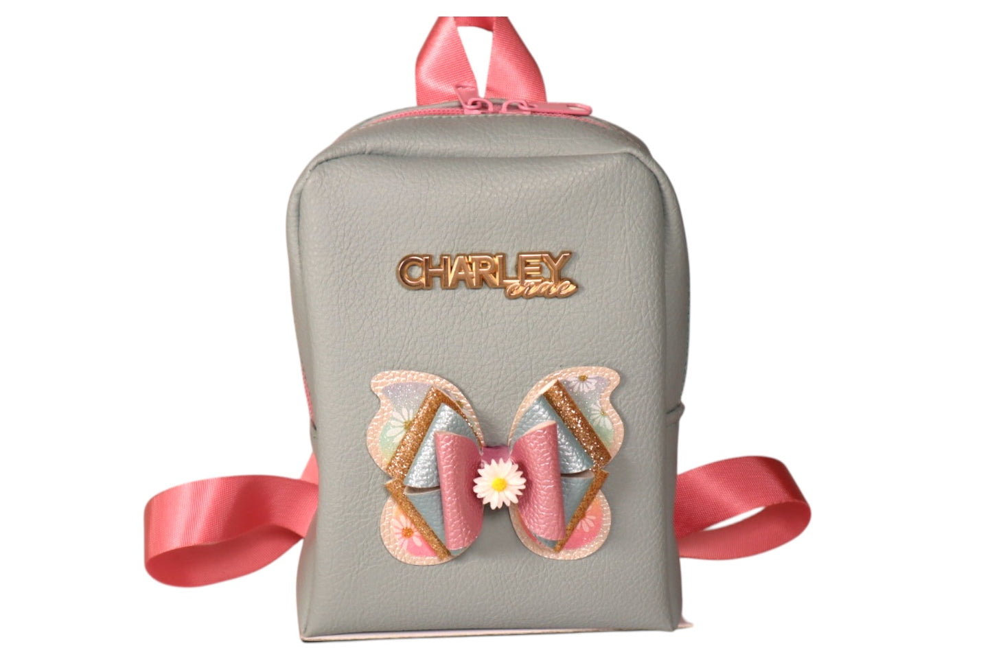 Handmade light blue toddler backpack with pink straps and butterfly bow accent